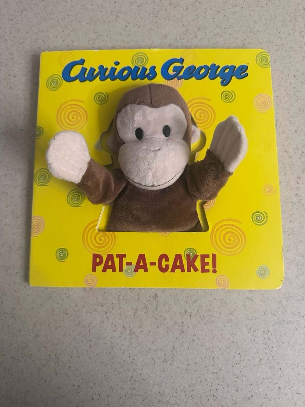 Curious George Pat-A-Cake! Interactive Board Book with Attached Hand Puppet